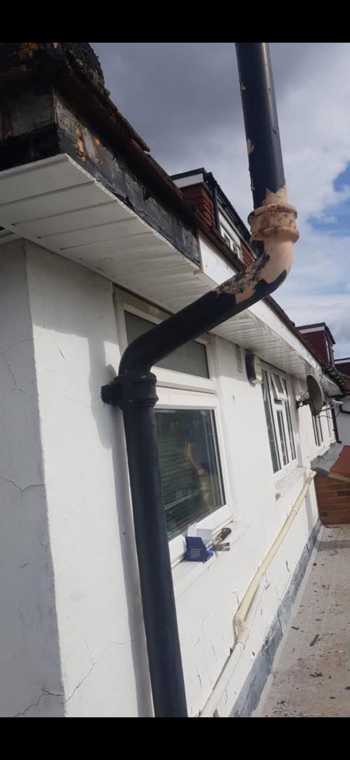 Old deteriorated downpipe