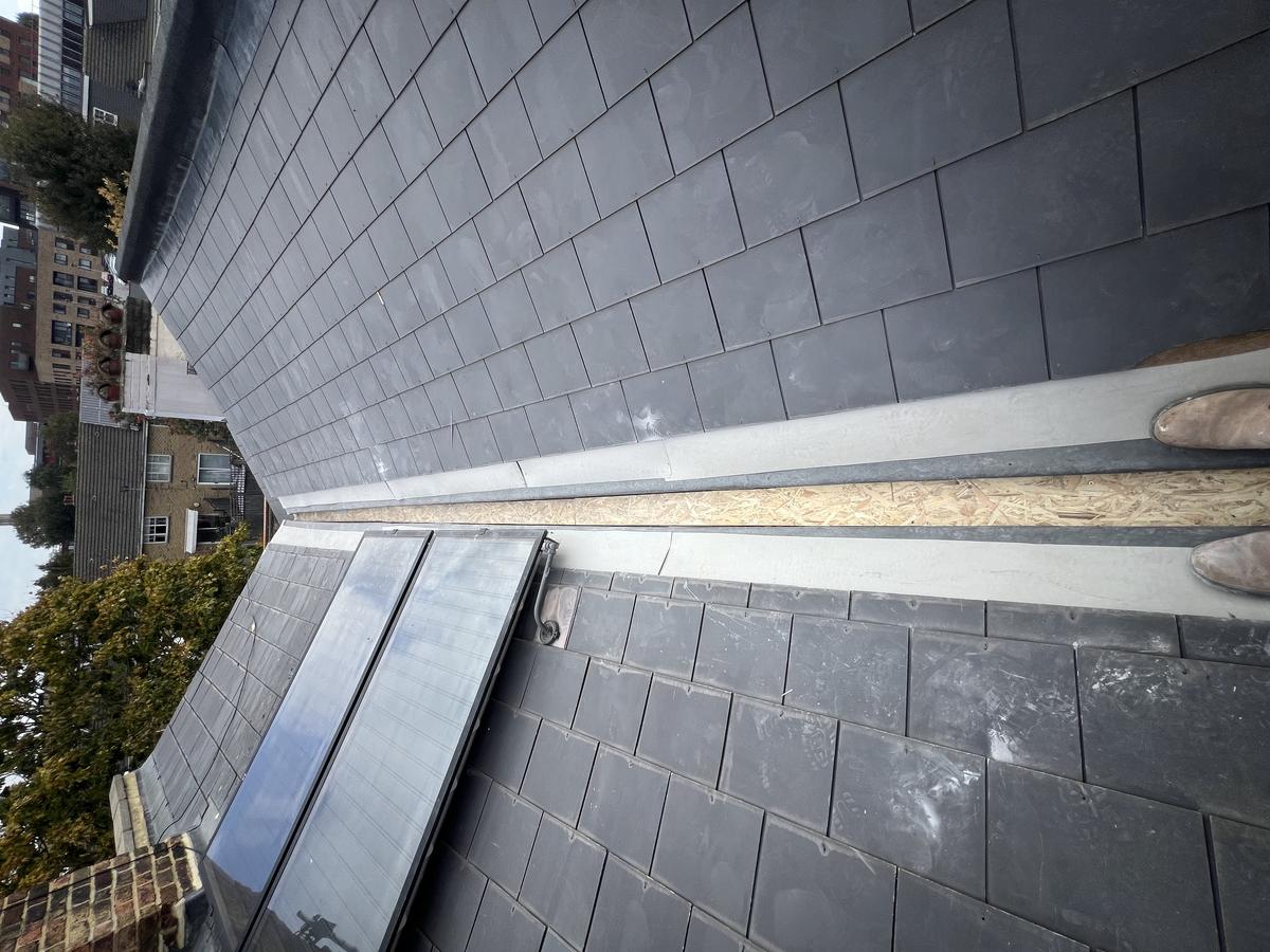 Slate repair with flashing